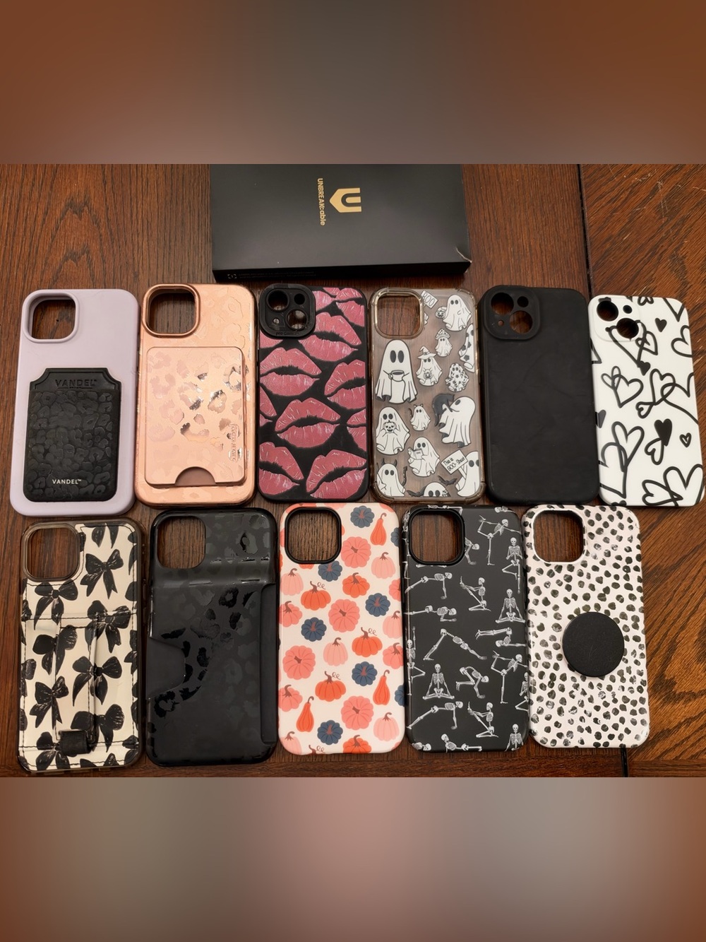 Bundle of Eleven iPhone 14 cases with two screen protectors